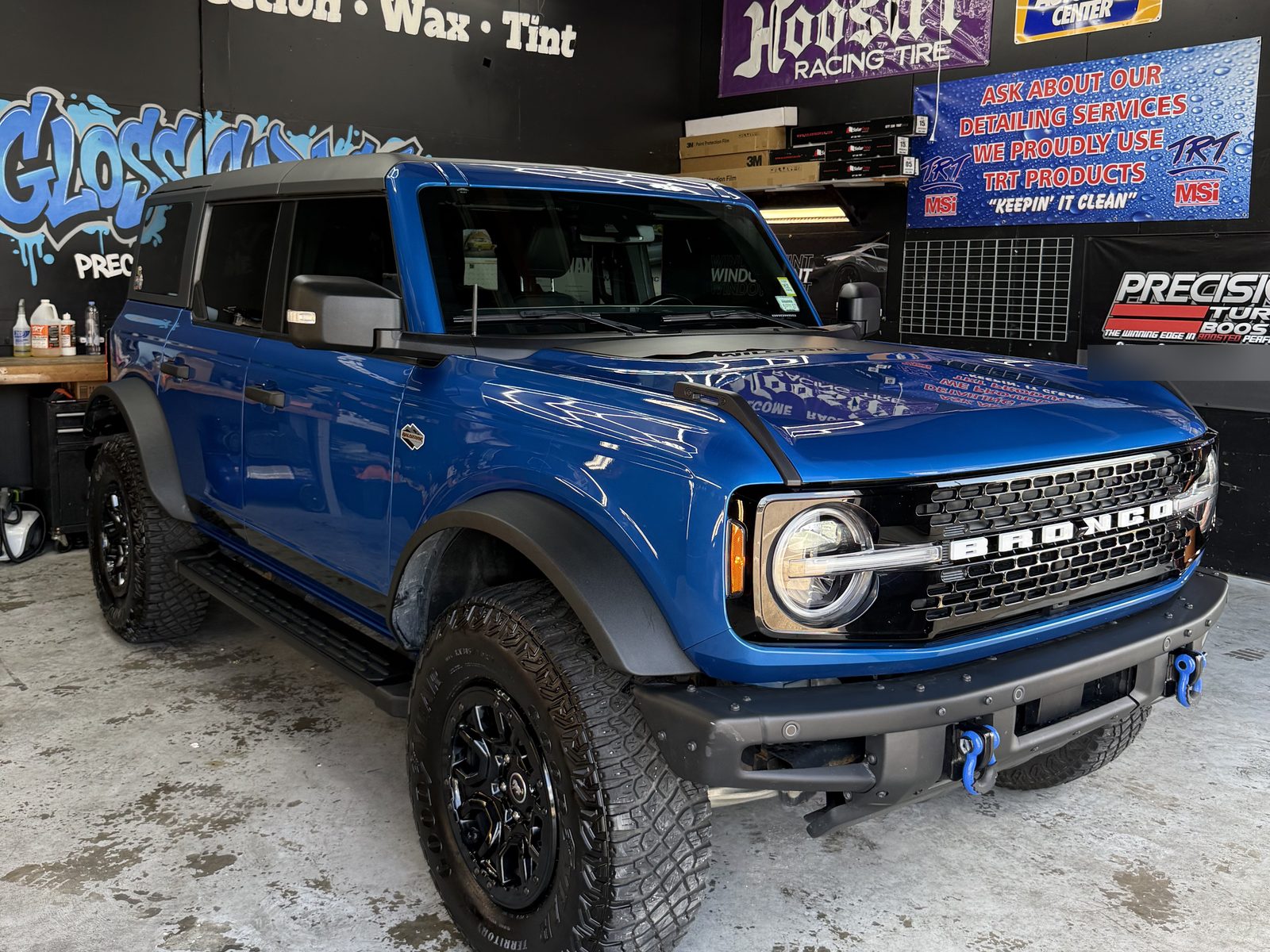 Bronco in front of the Gloss Garage mural