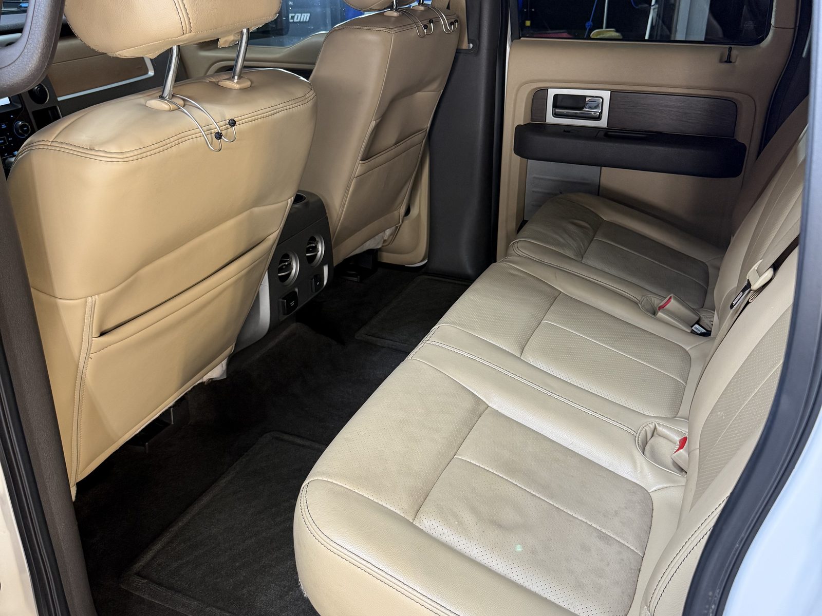 Clean tan leather rear seat