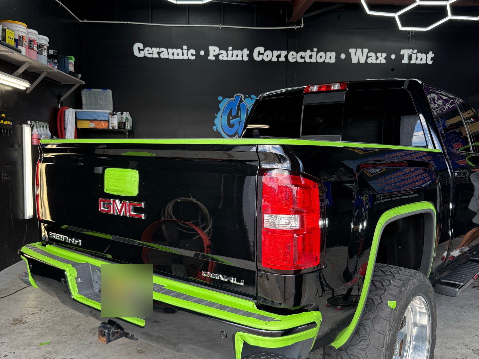Denali tailgate masked in green tape